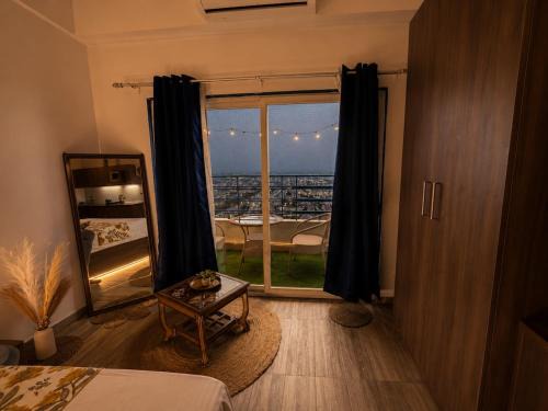 Greater Noida Bed & Breakfast | Aesthetic High-Rise Studio, Balcony & Villa View
