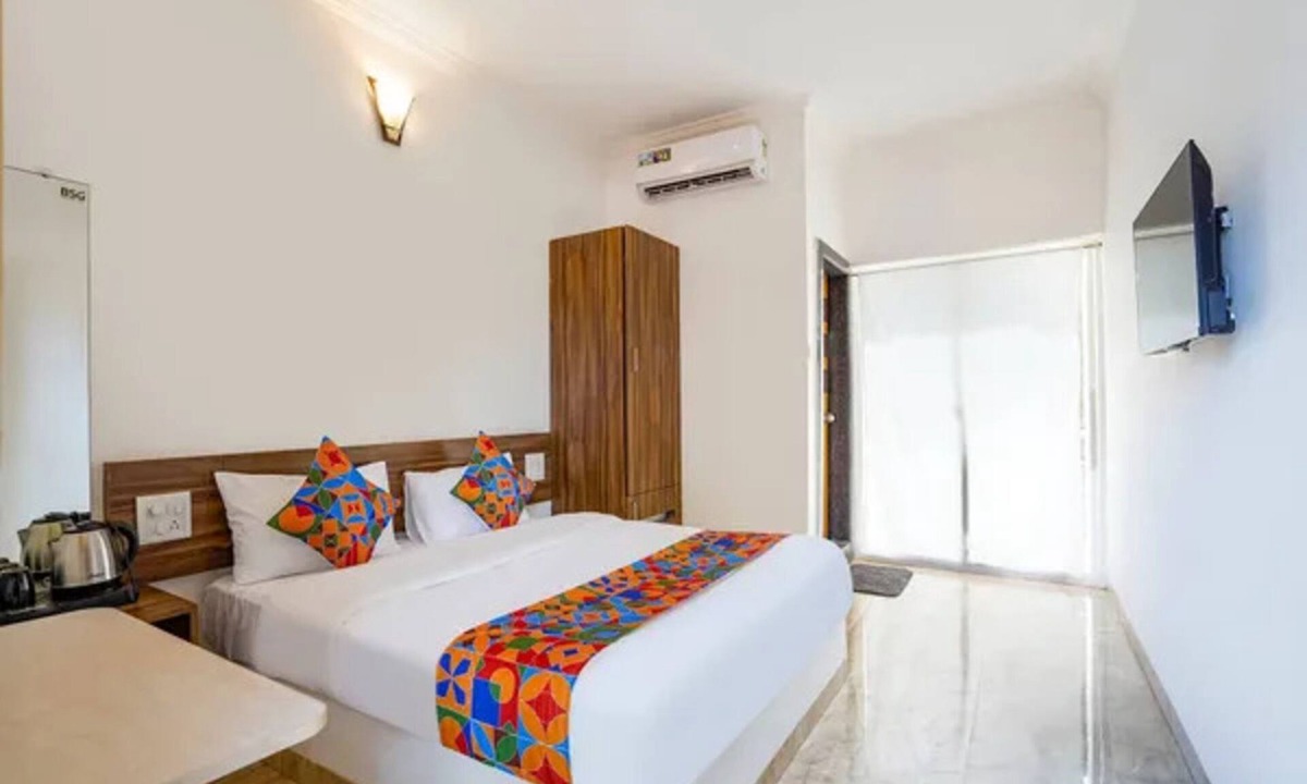 Morjim Hotel | FabHotel Palm Inn Resort
