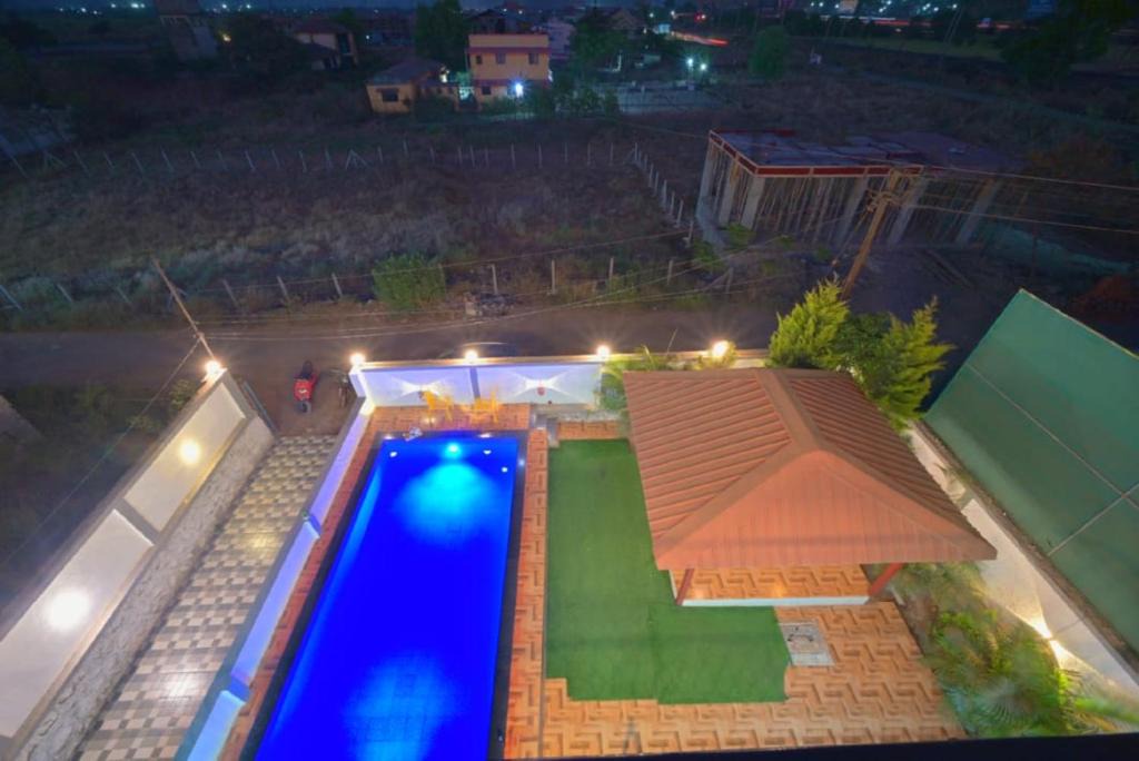 Malavli Villa | I EMPYREAN STAYS ll MYSTICAL STONE VILLA ll 4BHK II AC II PRIVATE POOL II
