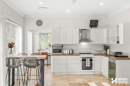 Erina House | KozyGuru | Erina | Sunny Coastal Escape + Parking