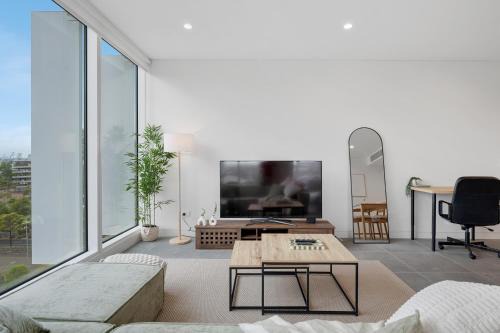 Lidcombe Apartment | Modern Getaway with Stunning Accor Stadium Views