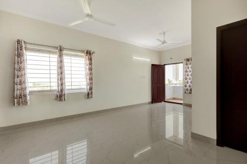 Kakinada Hotel | OYO Hotel O Ramaraopet Near Kakinada Beach