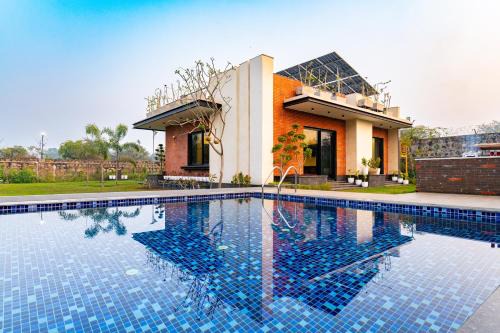 Gurugram Villa | Prassanam Vatika 2-BHK Hillside Villa with Private Pool & Expansive 1-Acre Garden