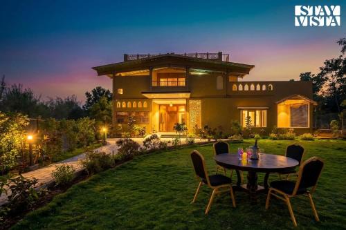 Turiya Villa | StayVista at Vannraj Farm Villa with Shared Pool & Bonfire