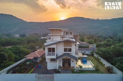 Lonavala Villa | StayVista's Kaarma Villa - Valley-View Villa with Outdoor Pool, Lawn featuring a Gazebo & Machan