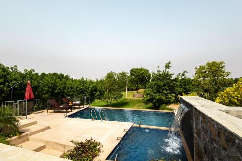 Jalor Villa | Stone Age Home Fernwood 6-BHK Stone-Clad Estate with Bamboo Cottages, Private Pool, Gazebo & Terrace Garden