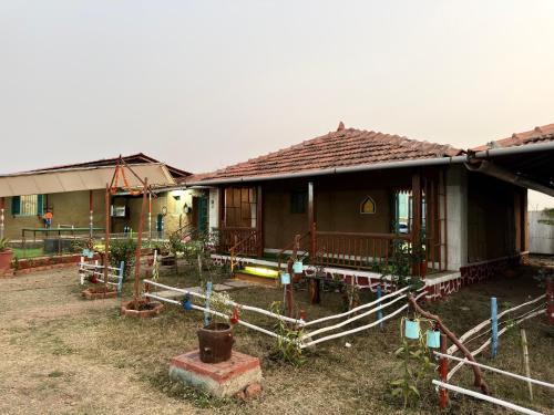 Nashik House | The Peepal mud homes farm stay