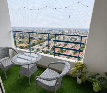 Greater Noida Bed & Breakfast | Aesthetic High-Rise Studio , Balcony & Villa View