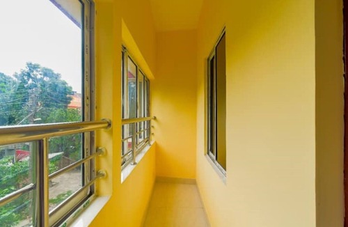 New Town Apartment | Bedroom with a balcony view - CORPORATE INN