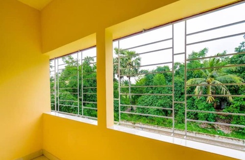 New Town Apartment | Bedroom with a balcony view - CORPORATE INN
