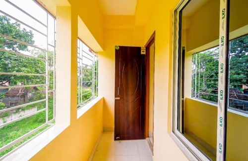 New Town Apartment | Bedroom with a balcony view - CORPORATE INN