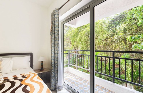 Siolim Condo | Bela Vista - 2BHK Balcony View Over Fields + Pool
