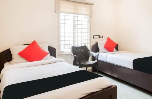 Guntur Hotel | Capital O Aditya Grand