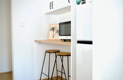 The Entrance Apartment | Coastal Minimalist Retreat Steps from the Water