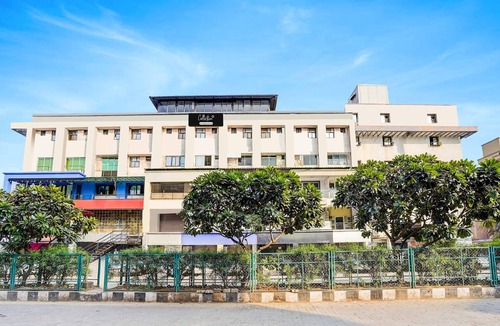 Infocity House | Deluxe Infocity Metrohotel Grand Krishna