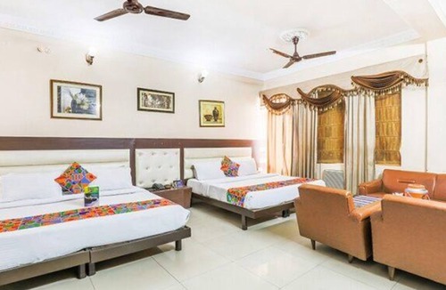 Mayapur Hotel | FabHotel Pramila Inn