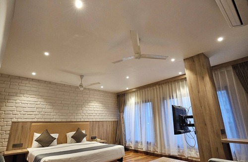 New Town Hotel | FIRANGIPANI SUITES