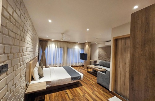 New Town Hotel | FIRANGIPANI SUITES