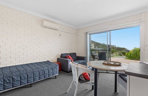 Narooma Apartment | Golfers View Unit 1 - enjoy spectacular views of the ocean and golf course.