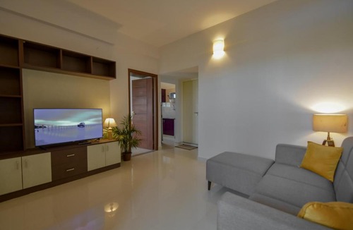 Palm Meadows Apartment | HomeSlice Whitefield - 1BHK, 2BHK Service Apartment