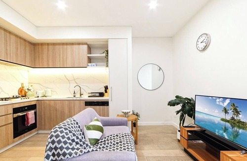 Burwood Apartment | KozyGuru | Burwood | Harbour Bridge-View Apt