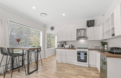 Erina House | KozyGuru | Erina | Sunny Coastal Escape + Parking