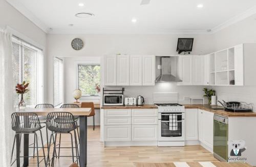 Erina House | KozyGuru | Erina | Sunny Coastal Escape + Parking