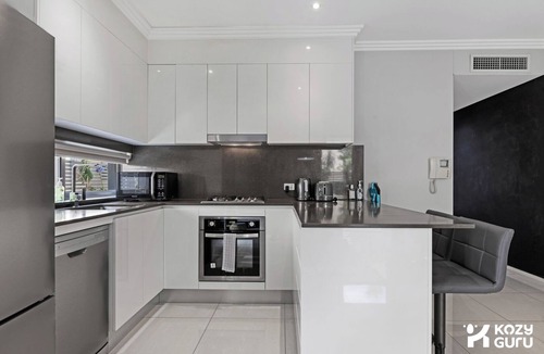 Ryde Apartment | KozyGuru | Ryde | Cosy 2Bed Apt with Private Yard