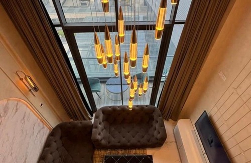 Gurugram Apartment | Luxury duplex with pool view in Gurugram stay
