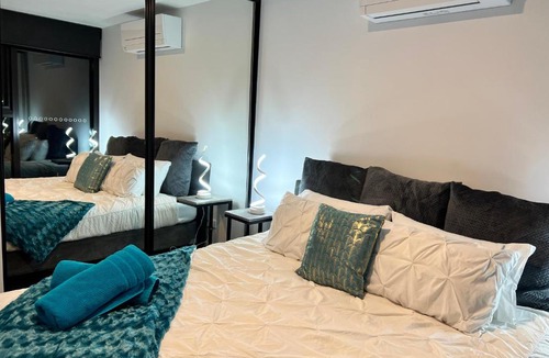 Braddon Apartment | Midnight Luxe 2BR 2Bath Apartment 408 in the heart of Braddon Pool Sauna L4 Views Secure Parking Wine WiFi