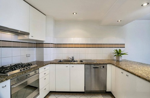 Milsons Point Apartment | Milsons Point- ALF49 Alfred St (south) - Penthouse-Style 2BR with Harbour Views Parking by Milsons Point Station