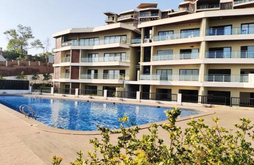 Vainguinim Apartment | Modern 2BHK Apartment in Panjim with Sea View & Pool Access
