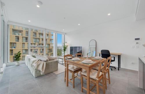 Lidcombe Apartment | Modern Getaway with Stunning Accor Stadium Views