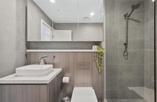 Lidcombe Apartment | Modern Getaway with Stunning Accor Stadium Views