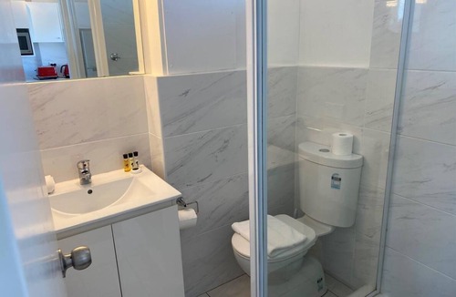 Neutral Bay Apartment | Neutral Bay- WY603 Wyagdon Street - Modern Studio with Harbour Views, Pool Parking in Secure Building