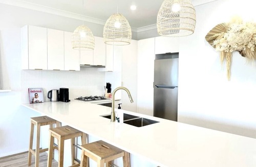 Gosford Apartment | Newly renovated top floor apartment with beautiful views and a pool to enjoy.