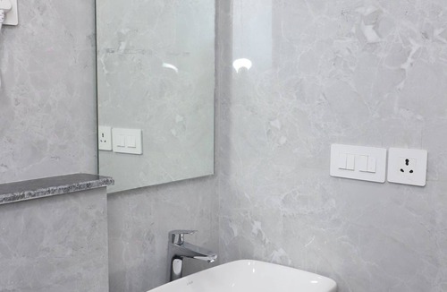 DLF City Apartment | Nova by Dailystays