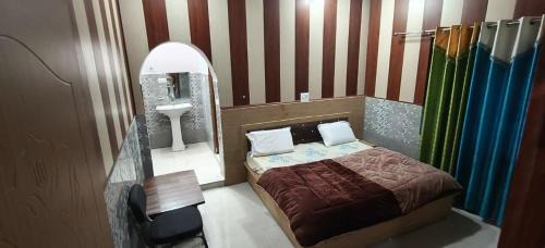 Kharsali Hotel | Omji Niwas - Kalindi