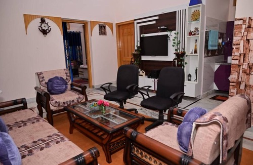 Rajgarhi House | Peaceful stay : 2-bedroom, bright living area, kitchen, terrace, and garden