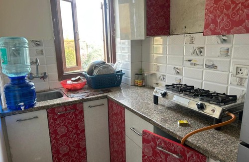 Sainik Farm Apartment | Private 1BHK Retreat Forest View Kitchen Free WiFi