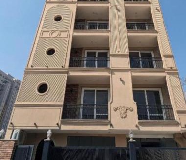 Gurugram Apartment | Sandstone Room