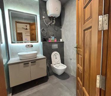 Gurugram Apartment | Sandstone Room
