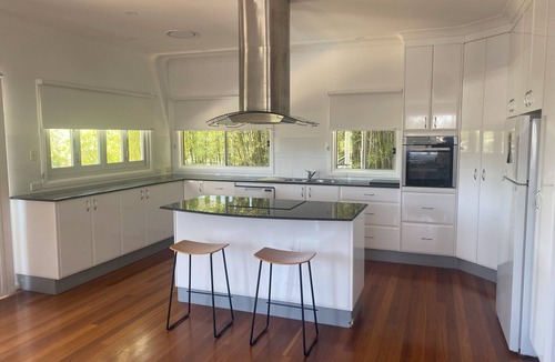 Forresters Beach House | Spacious holiday house ducted air conditioning walk to beach. In ground pool.
