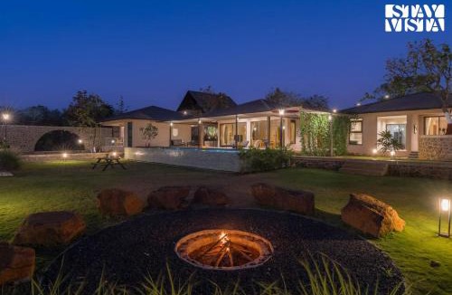 Nashik Villa | StayVista at Bohemian with Infinity Pool, Lawn