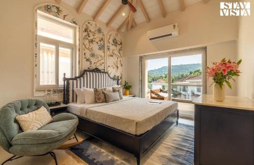 Colvale Villa | StayVista at Casa Bliss with Pool, BBQ and Karaoke