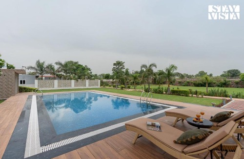 Gurugram Villa | StayVista at Sunrise Manor with Pool and Lawn