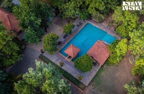 Turiya Villa | StayVista at Vannraj Farm Villa with Shared Pool & Bonfire
