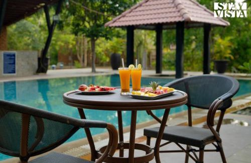 Turiya Villa | StayVista at Vannraj Farm Villa with Shared Pool & Bonfire