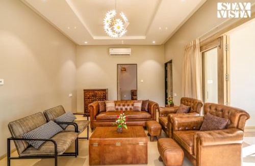 Turiya Villa | StayVista at Vannraj Farm Villa with Shared Pool & Bonfire