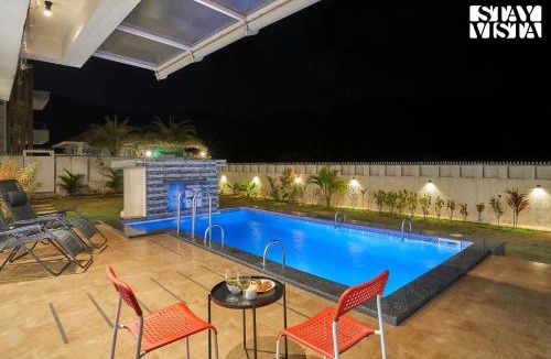 Lonavala Villa | StayVista's Kaarma Villa - Valley-View Villa with Outdoor Pool, Lawn featuring a Gazebo & Machan